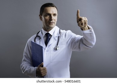 Strict Doctor Pointing Up With His Finger