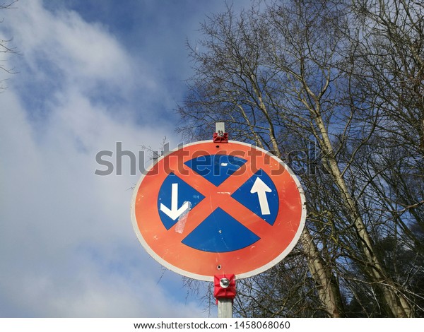 Strict\
prohibition of holding with blue sky and white clouds in\
Oerlinghausen in East Westphalia in\
Germany