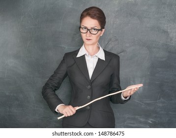 Strict Teacher With Wooden Stick 