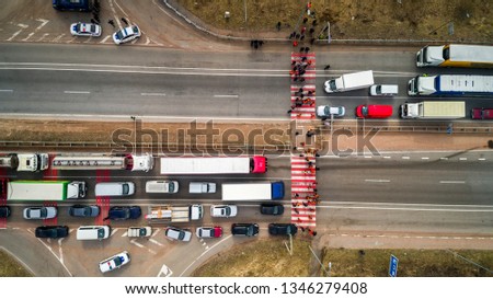 Strike and protest of people. Blocked the road. Crowd of annoyed protesters blocking road with demands to government, rally. Stock photo © 