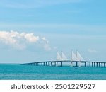 Striking image captures the iconic Penang Bridge spanning across the sparkling waters of the Andaman sea. Bridge