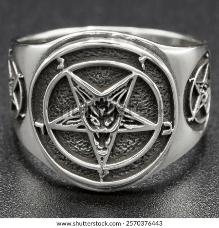 A striking silver ring featuring the Baphomet pentagram design, exuding dark mysticism and occult symbolism. Perfect for adding a bold statement to any gothic or alternative style