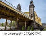 A striking view from below the Sixteenth Street Bridge, also known as the David McCullough Bridge, in Pittsburgh