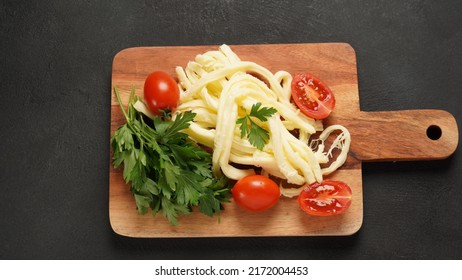 String Cheese Or Cheese Whip - Salty Snack Cheese With Cherry Tomatoes And Herbs On Chopping Board. Turkish Cheese