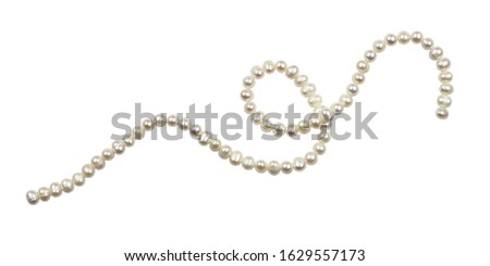 String of freshwater pearls isolated on white