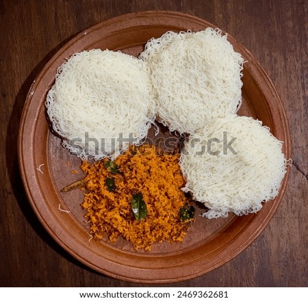 String Hoppers with Coconut Sumbol