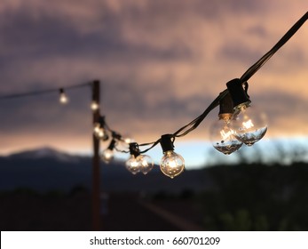 String Lights During Mountain Sunset.