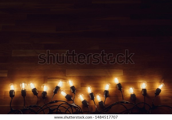 String Lights On Wooden Floor Stock Photo Edit Now 1484517707