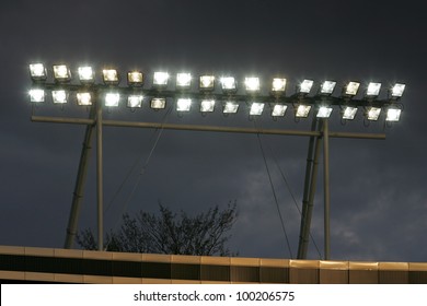 string of lights turned on and a cloudy sky in the background