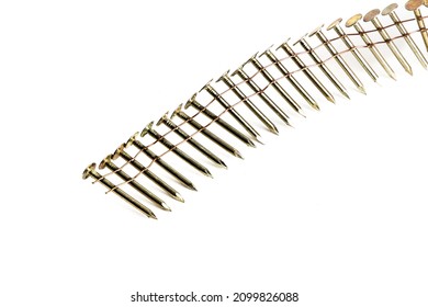 A String Of Roofing Nail Gun Nails Isolated On White