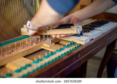string wooden piano keys on pins, piano tuning, tuner, musical. - Shutterstock ID 1857658189