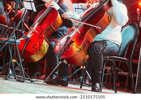 Stringed musical instrument double bass in the orchestra. The concept of culture and art.