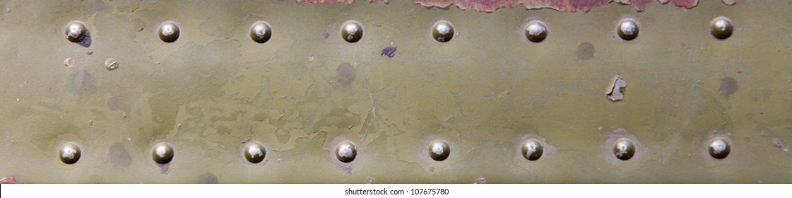 Strip Of Metal Surfaces With Rivets