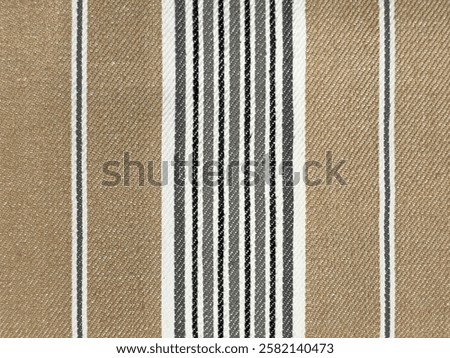 Stripe fabric seamless pattern. The texture of linen fabric in stripes pattern of brown, white, grey and black. Thick fabric cloth texture background for furniture, home decor, interior design.