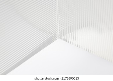 Stripe Texture Acrylic Sheet. Clear Linear Prismatic Panel, Extruded Linear Ribs Acrylic Sheet. Abstract Minimal Graphic Design Resource.
Close Up Of Clear Transparent Plexiglass.