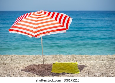 Striped Beach Umbrella On Beach Stock Photo 308195147 | Shutterstock