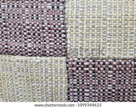 Striped diagonal cushions cut in square.
