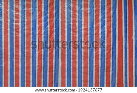 striped fabric texture, red, white and blue nylon bag	