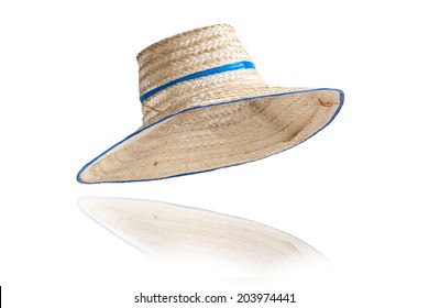Striped hat made ??of woven bamboo on white background.