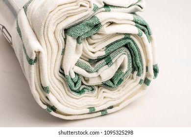 Striped Kitchen Towel Roll Isolated On White Background. Table Cloth Kitchen Green And White Color.