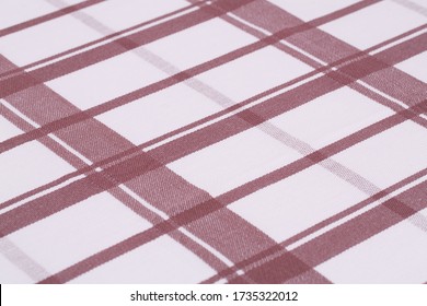 Striped tablecloth texture as a background, closeup picture.