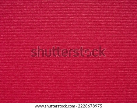 Stripedred metalized red paper page background. Perfect designer carton or cardboard texture for making winter season Christmas festival card sheet, text, lettering, wall screen saver or art work.