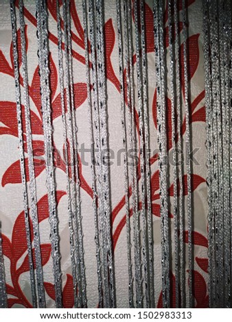 Similar – Space. Wallpaper with forest motif, in the mirror is reflected a red and white chequered curtain and a neon tube. Lost taste, in need of renovation.