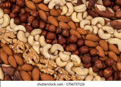 Stripes made of nuts, almond, cashew nuts, Brazil nut, walnut, hazelnut
