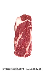 Striploin Beef Steak Isolated On White Background, Overhead View. Uncooked Prime Beef Raw Steak. Single Raw Sirloin Steak From Marbled Beef On White Background. Black Angus Chuck Beefsteak Meat.