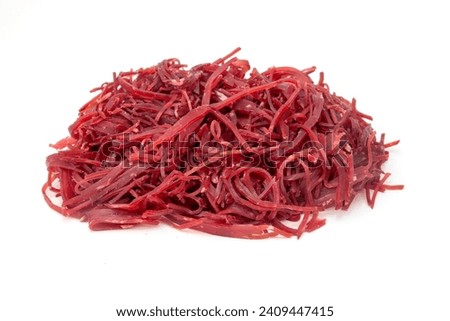 Strips of bresaola on a white background
