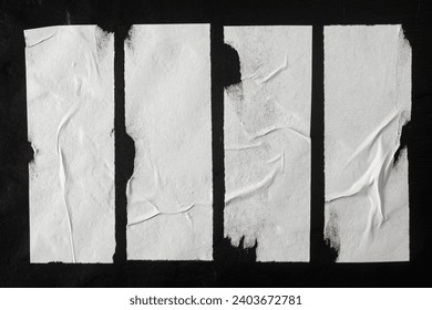 Strips of white crumpled paper with folds as a background.