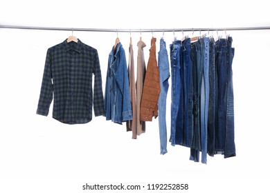 stripy shirt ,jeans, jacket, ,sweater clothes on Hangers-white background
 - Powered by Shutterstock