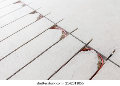 Strobe Line In Cement Screed For Laying Red Electric Cable For Underfloor Heating.