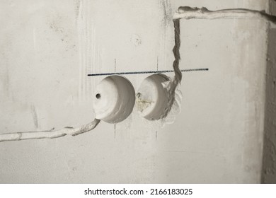 Strobe line for laying electric cable. Wiring repair and replacement concept. Plastered walls of the room with strobes for electrical wiring for installing wiring accessories