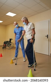 Stroke Patient Restoring Mobility In Rehab Center