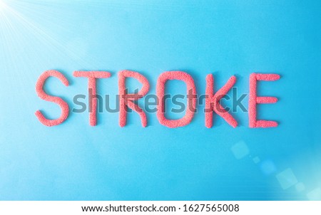 Stroke word in red letters on a blue background. Brain Vascular Stroke Disease Concept, haemorrhage