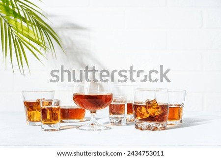 Strong alcohol drink. Whisky, rum, tequila, cognac.