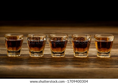 strong alcoholic drinks in glasses on the table, alcoholic beverages drinks
