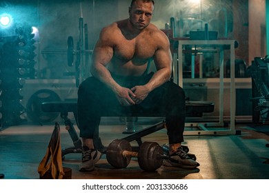 Strong Athlete In The Gym Training For Arm Wrestling Sparring. Bodybuilder Armwresler In Athletic Training Room