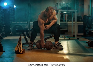 Strong Athlete In The Gym Training For Arm Wrestling Sparring. Bodybuilder Armwresler In Athletic Training Room