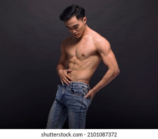 Strong Athletic Man Fitness Model Torso showing six pack abs