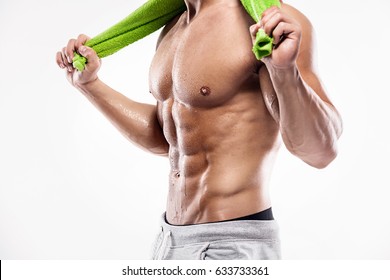 Strong Athletic Man Fitness Model Torso Showing Six Pack Abs. Holding Towel