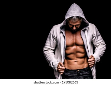 Strong Athletic Man On Black Background