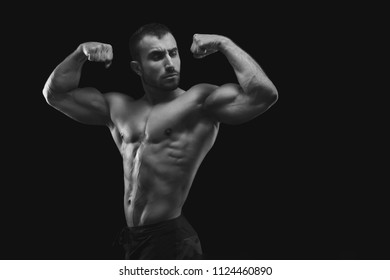 Strong Athletic Man Showing Big Biceps Stock Photo 1124460890 ...