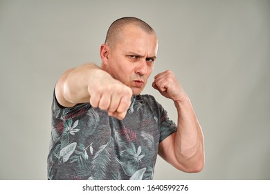 Strong Built Angry Man Punching Towards Stock Photo 1640599276 ...