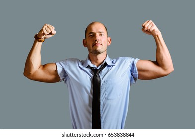 Strong Businessman Concept. Business Man Showing Muscular Hands