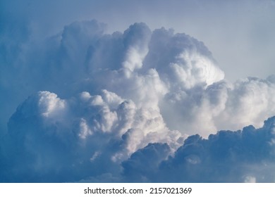 Strong cloud cover, bad weather. Stormy summer sky. Heaven and infinity. Gray clouds in the dark sky. Beautiful background. Cloudy clouds on a rainy day. A storm warning.