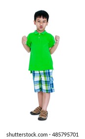 Strong And Confident Child. Full Body Of Happy Asian Child In Leather Shoes Looking At Camera. Stylish Boy Having Fun. Isolated On White Background. Studio Shot. Positive Human Emotion.