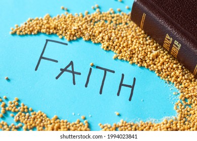 Strong faith like a mustard seed in God Jesus Christ. Parable of hope and trust. Golden Holy Bible with handwritten word text. The gospel of Matthew 17:20. Faithful Christian concept.
