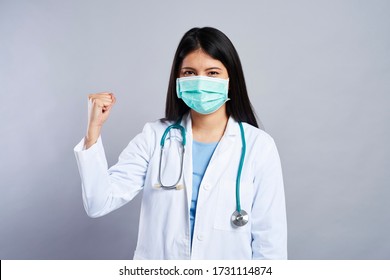 Strong Female Doctor In Studio Shot